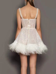 Inrosy robe patineuse plume brillante paillette à fines brides sans manches élégant mode de cocktail