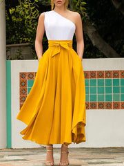 Inrosy longue jupe irrégulière unicolore fluide ceinture femme élégant mode