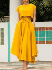 Inrosy longue jupe irrégulière unicolore fluide ceinture femme élégant mode