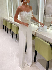 Inrosy combinaison tube à jambe droite bustier avec plumes élégant femme blanche