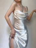 Inrosy mi-longue robe en satin moulante irrégulière dos nu à fines brides sans manches femme élégant de soirée invité mariage cocktail